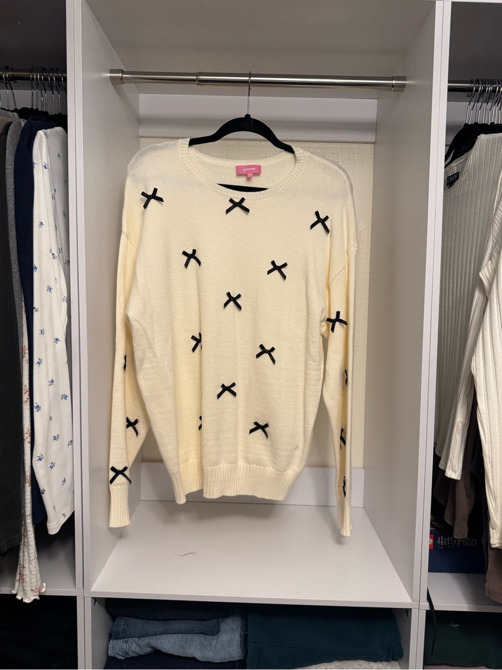 Edikted Cream Crewneck Sweater with Black Bows - tunic length